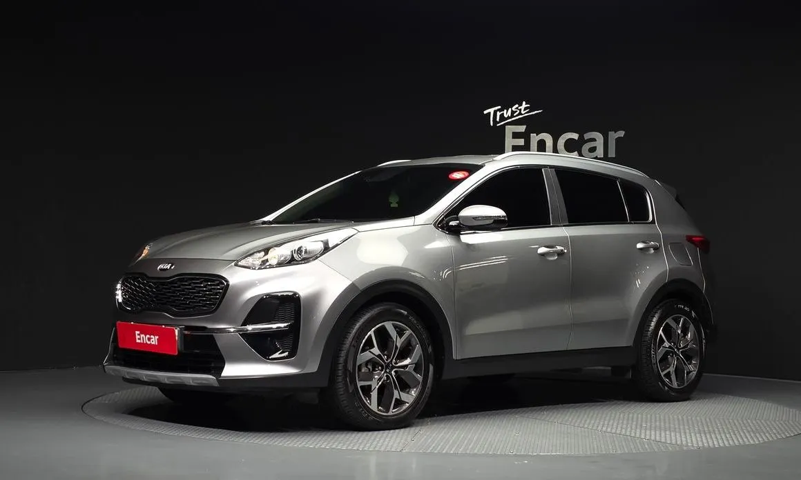 Kia Sportage — фото 1