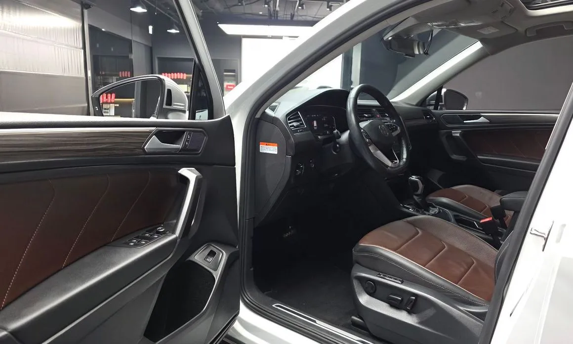 Volkswagen Tiguan — фото 10