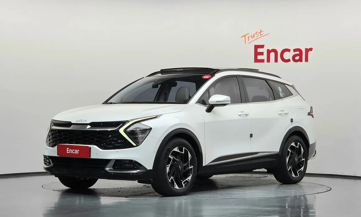 Kia Sportage — фото 1