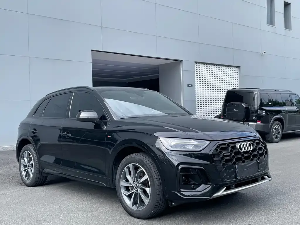 Audi Q5L — фото 5