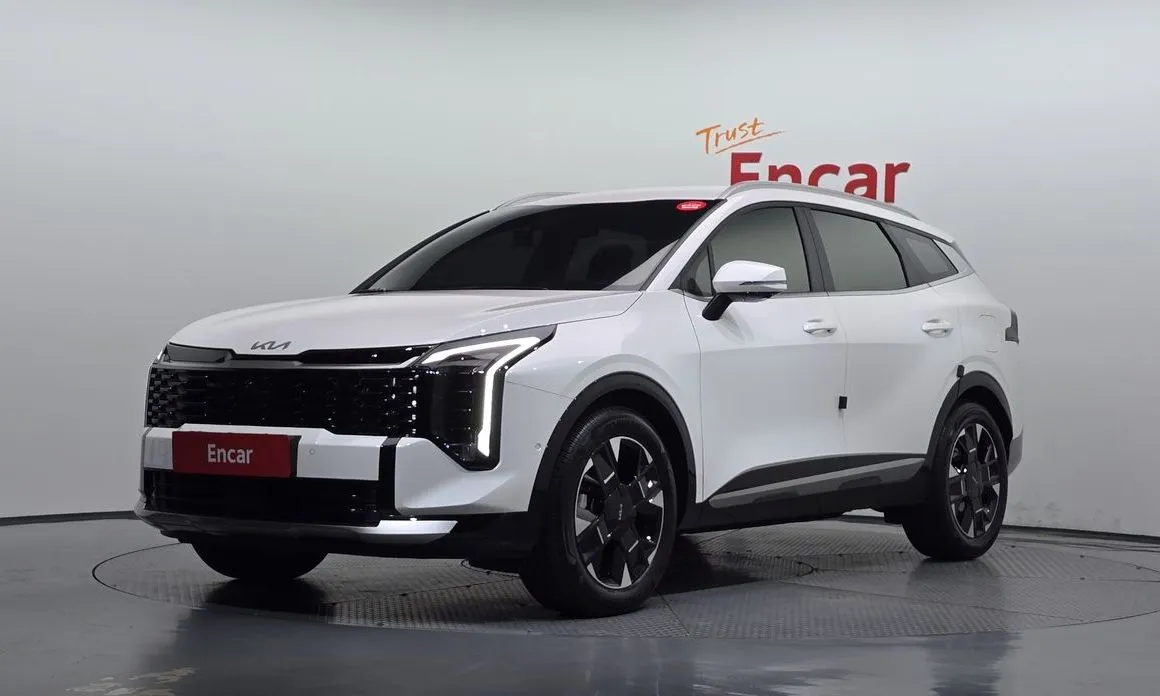 Kia Sportage — фото 1