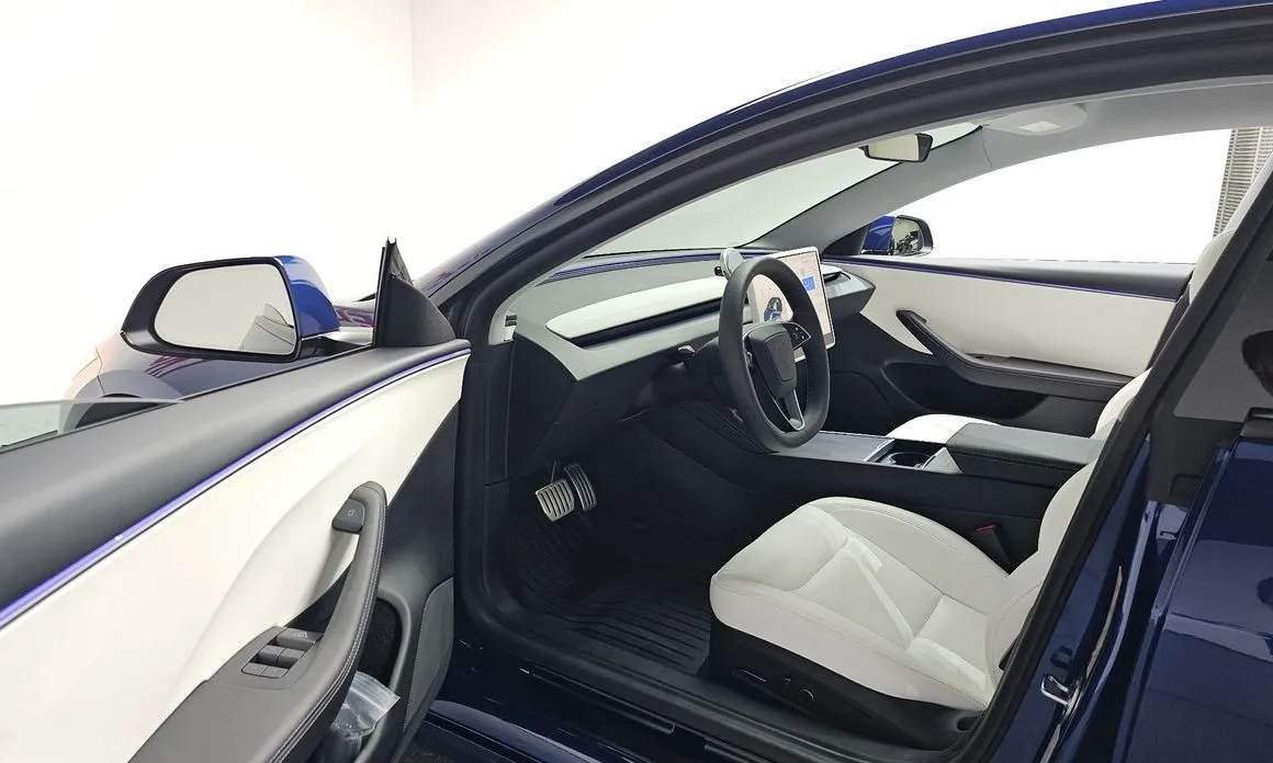 Tesla Model 3 — фото 8