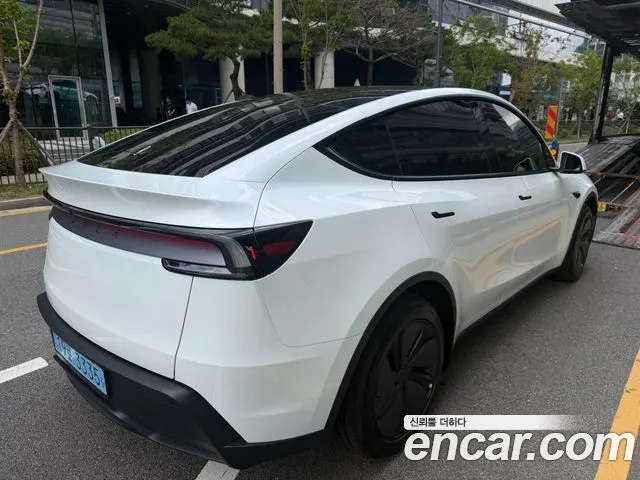 Tesla Model Y — фото 7