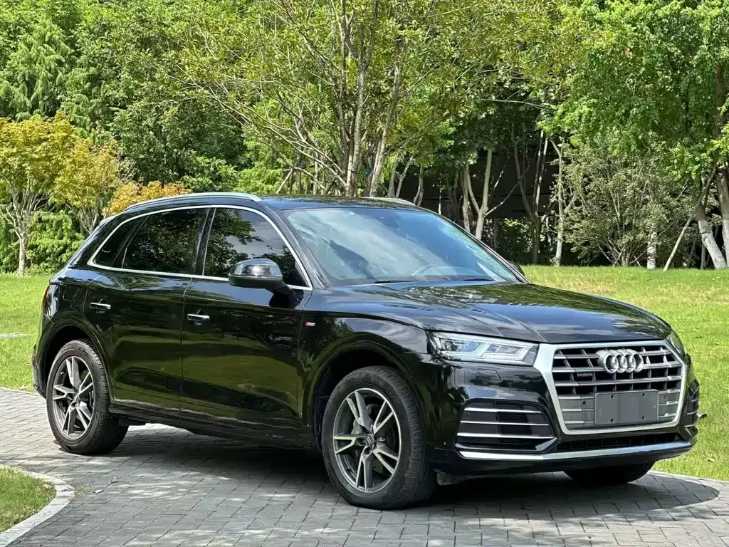 Audi Q5L — фото 9