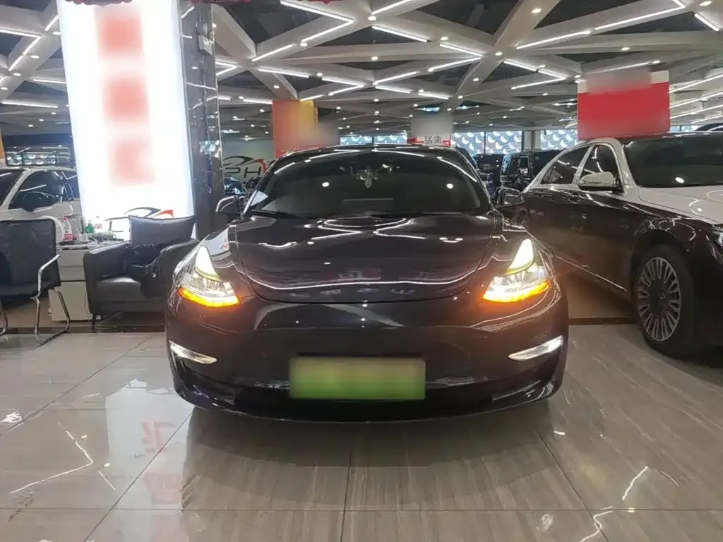 Tesla Model 3 — фото 5