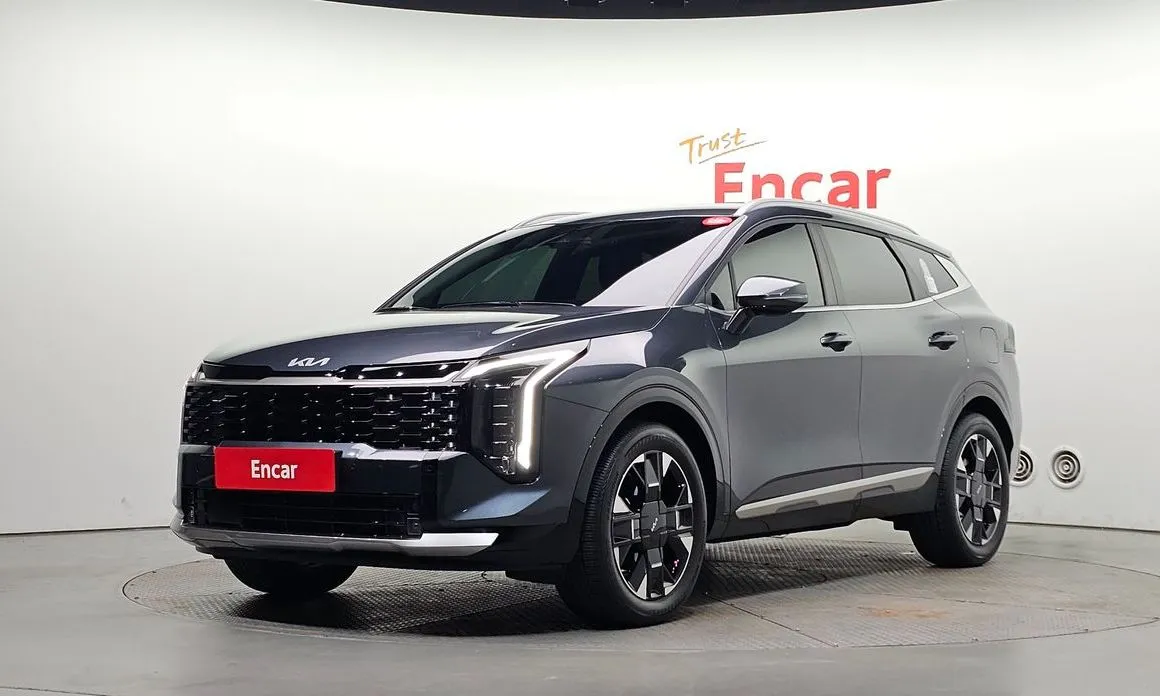 Kia Sportage — фото 1