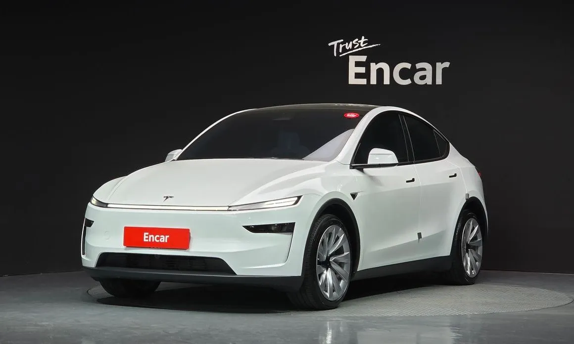 Tesla Model Y — фото 1