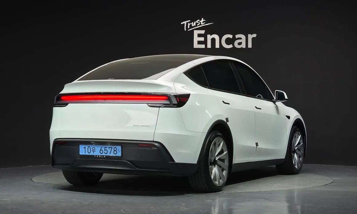 Tesla Model Y — фото 5