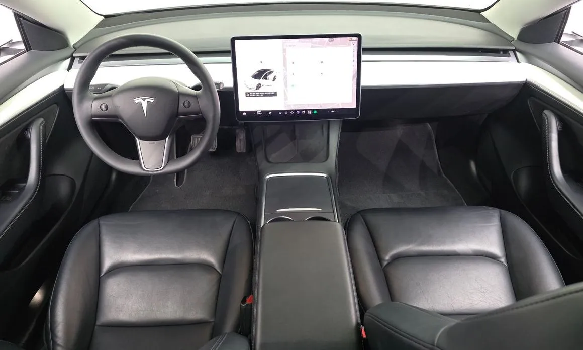 Tesla Model 3 — фото 7