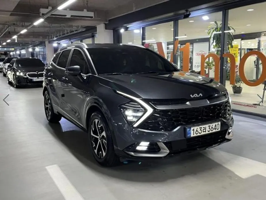 Kia Sportage — фото 1