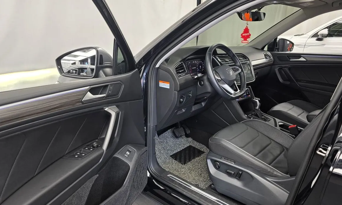 Volkswagen Tiguan — фото 9