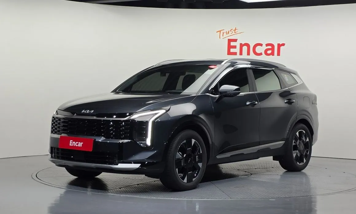 Kia Sportage — фото 1
