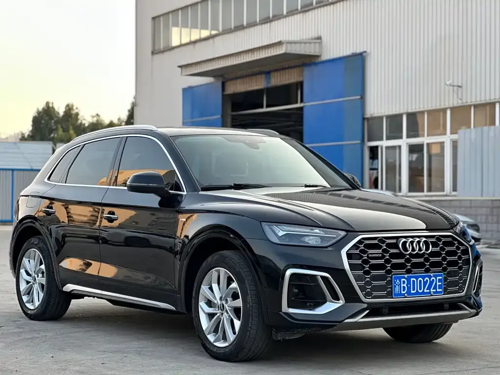 Audi Q5L — фото 5