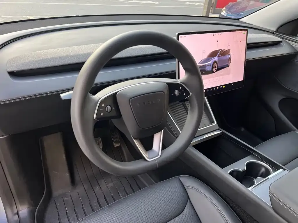 Tesla Model Y — фото 5