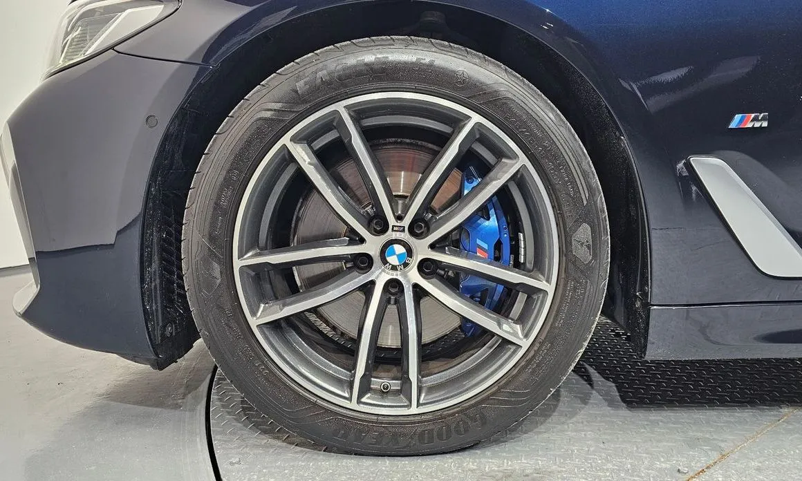 BMW 5-Series — фото 10