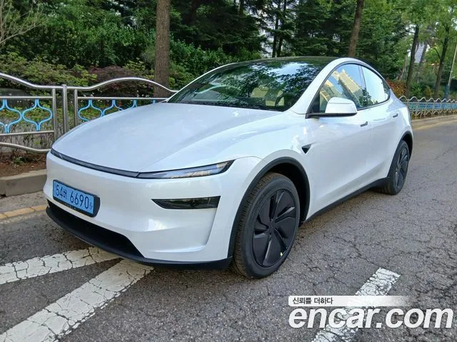 Tesla Model Y — фото 6