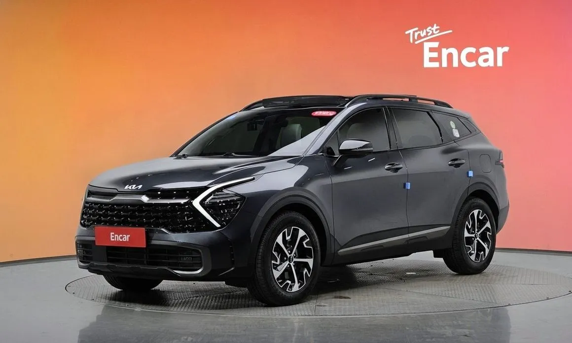 Kia Sportage — фото 1