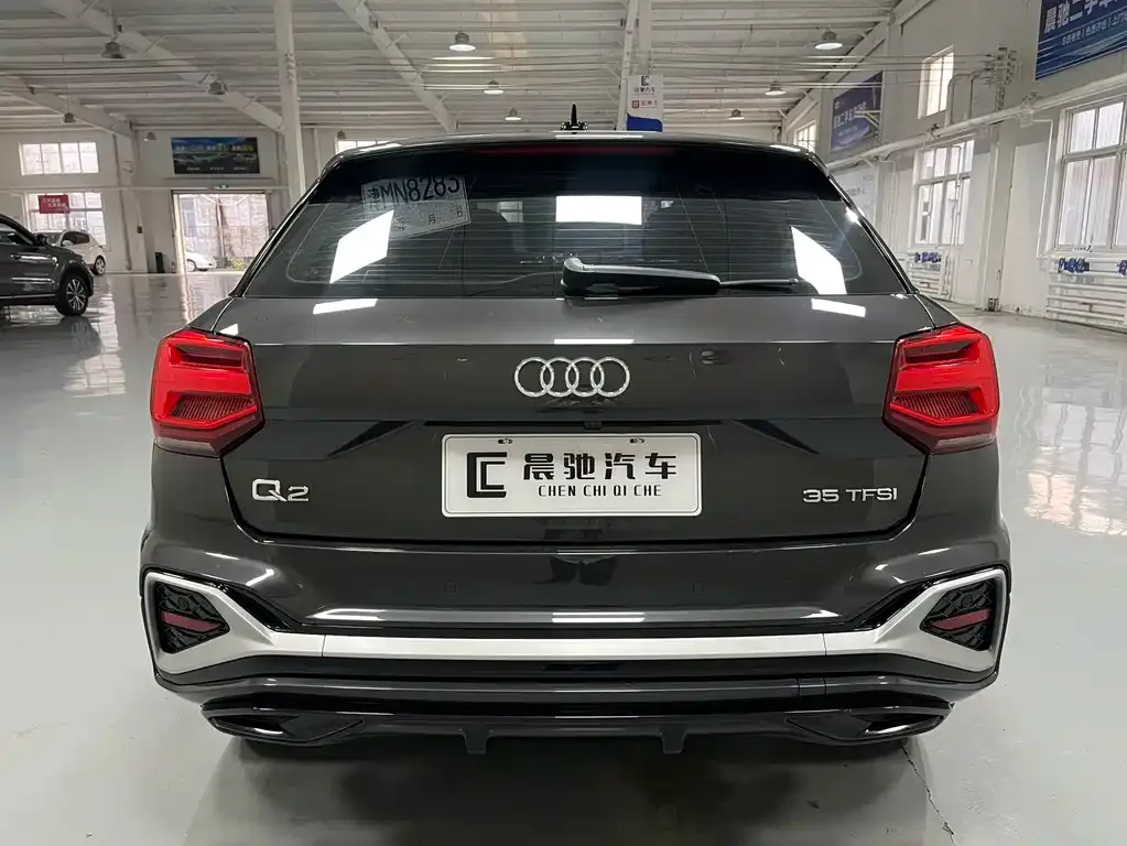 Audi Q2L — фото 7