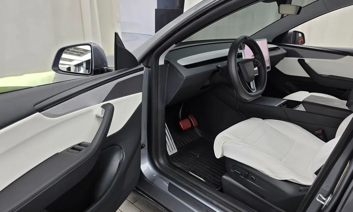 Tesla Model Y — фото 7