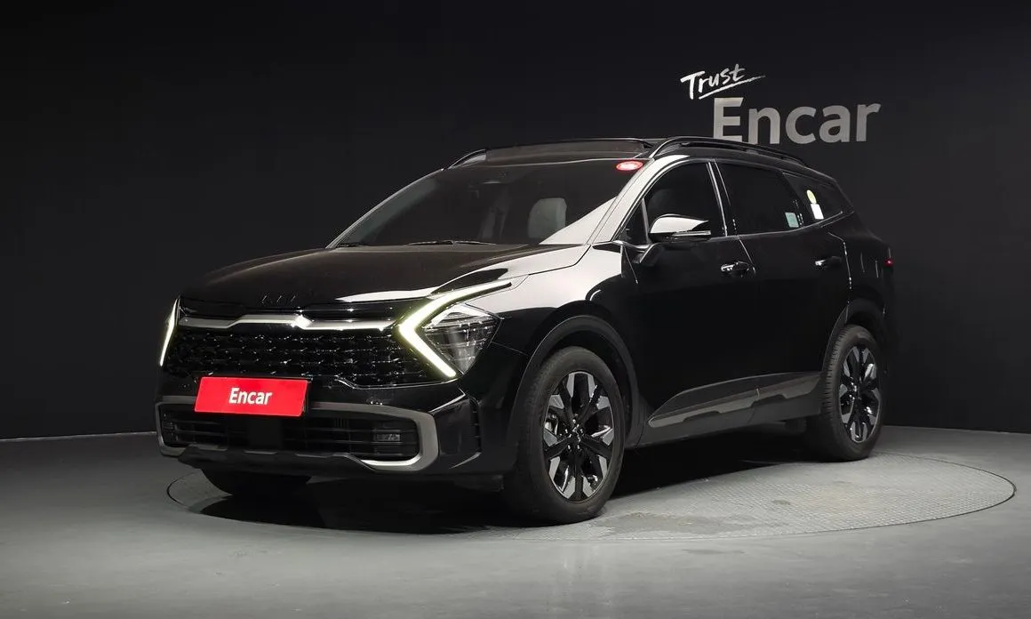 Kia Sportage — фото 1