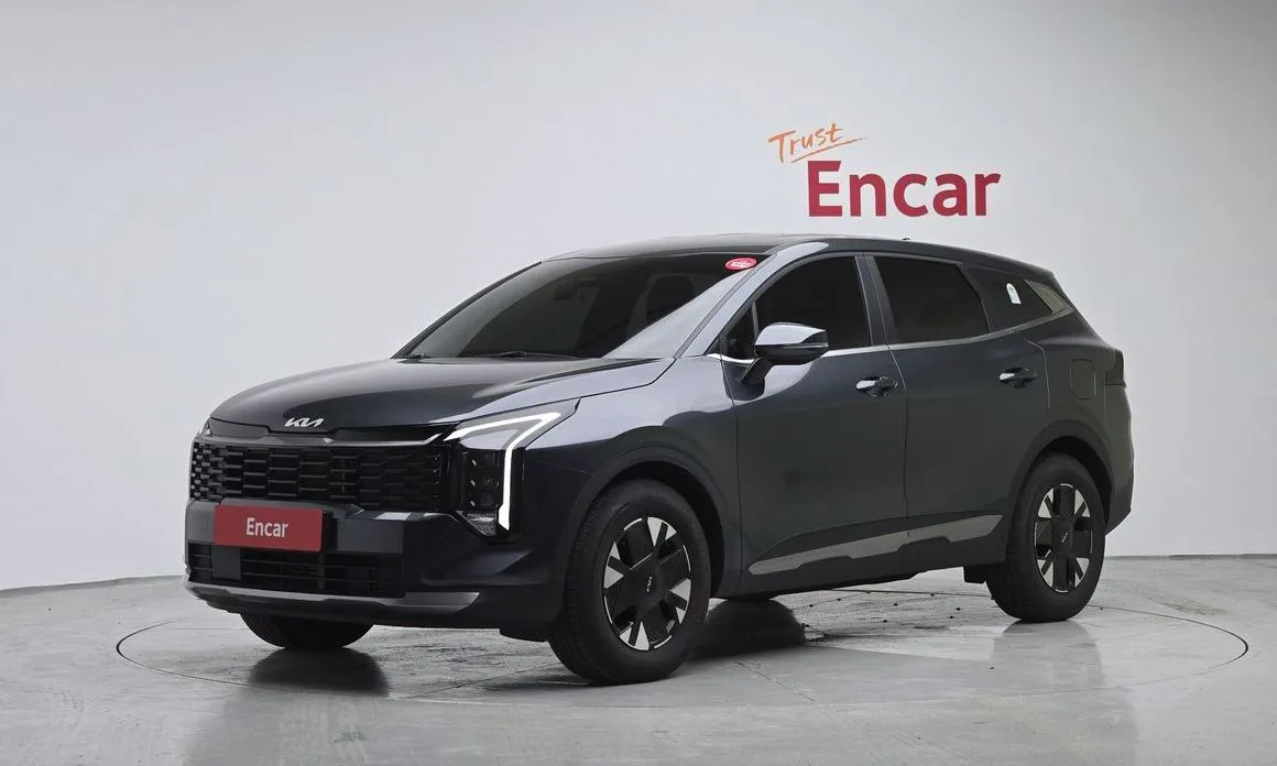 Kia Sportage — фото 1