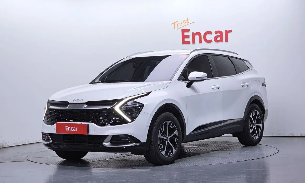 Kia Sportage — фото 1