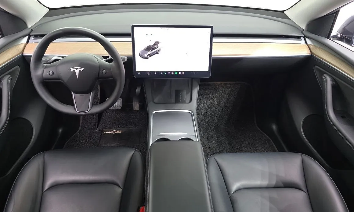 Tesla Model Y — фото 8