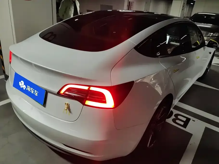Tesla Model 3 — фото 10