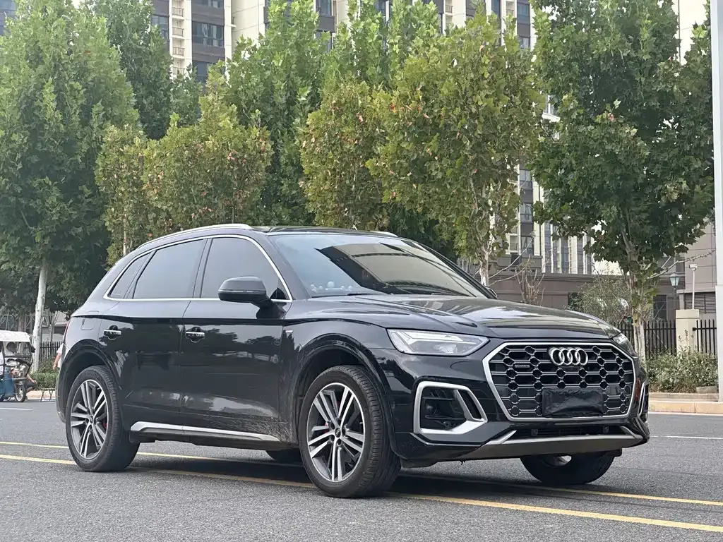 Audi Q5L — фото 5