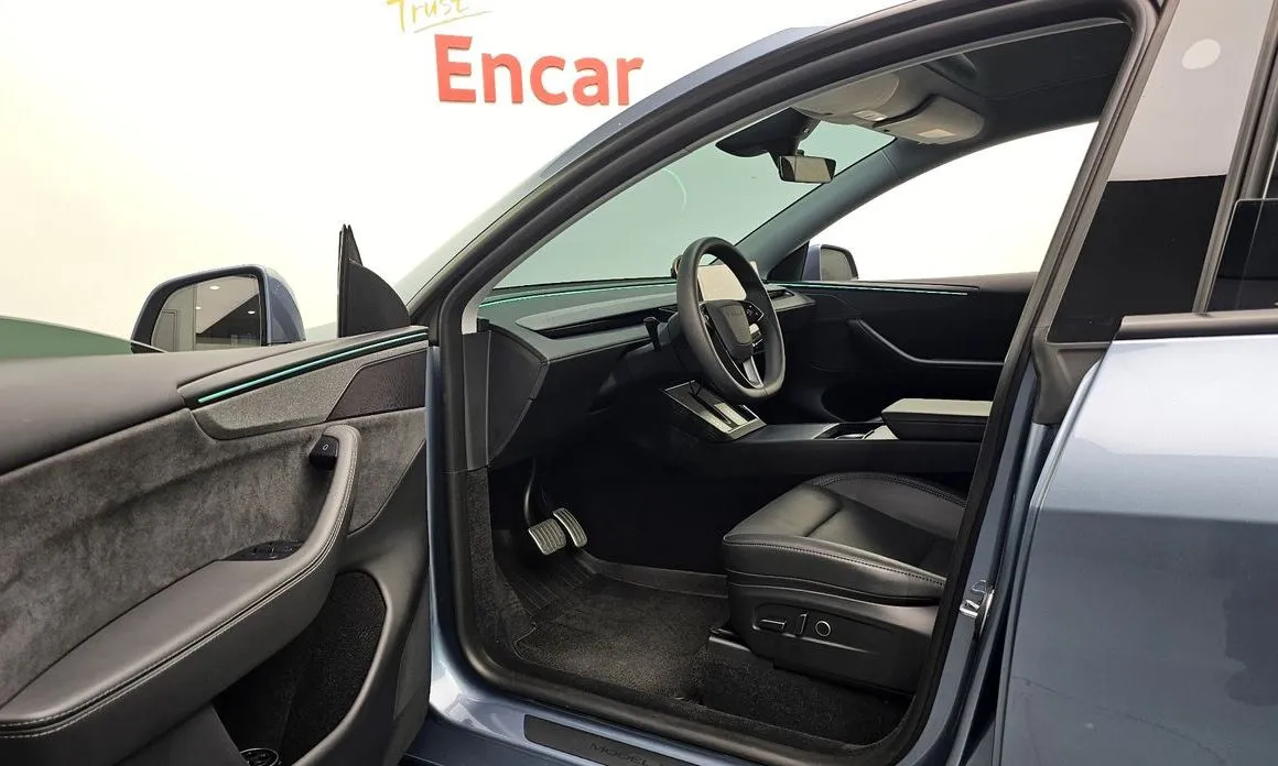 Tesla Model Y — фото 7