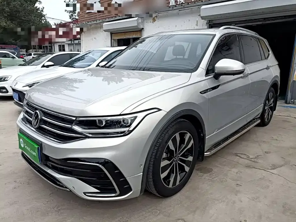Volkswagen Tiguan L — фото 1