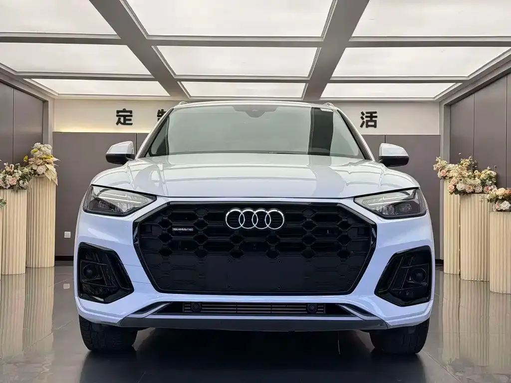 Audi Q5L — фото 5