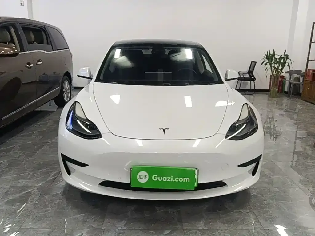 Tesla Model 3 — фото 10