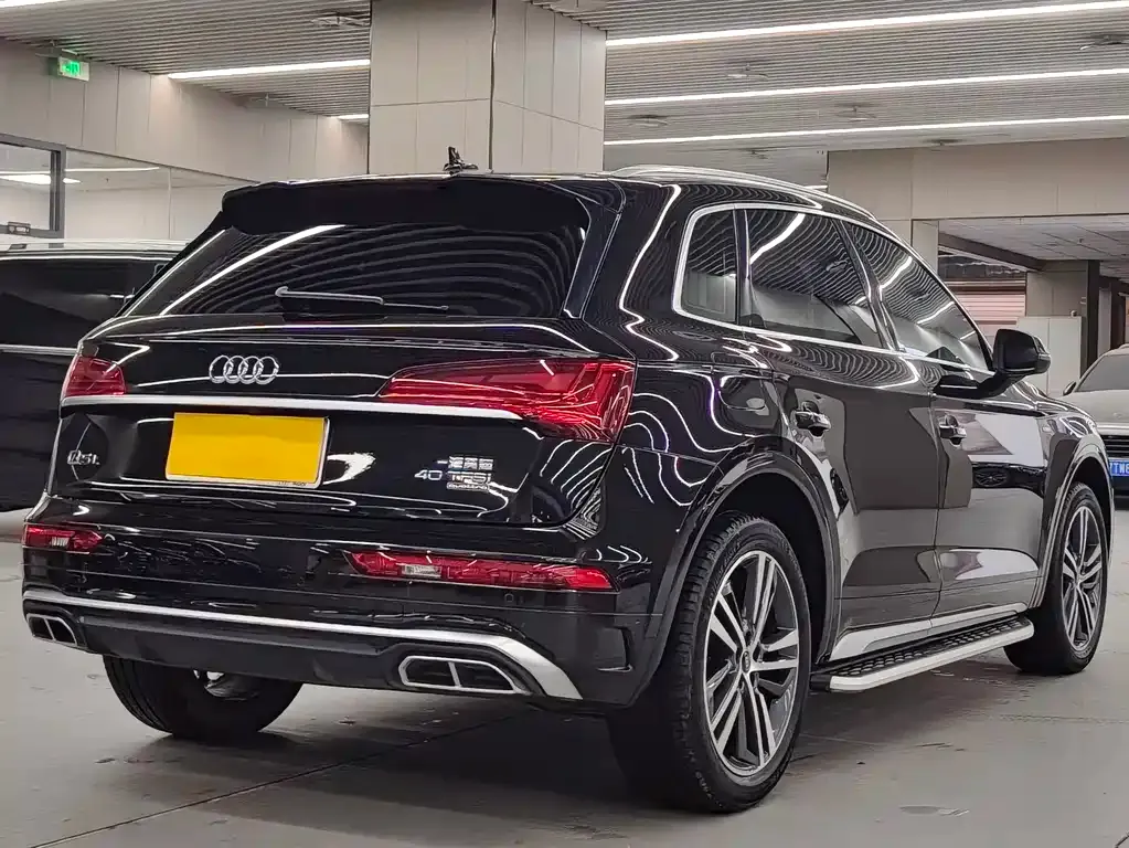 Audi Q5L — фото 10