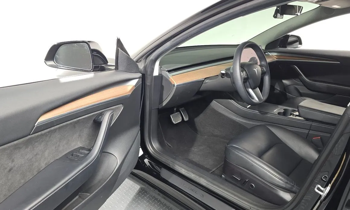Tesla Model 3 — фото 10