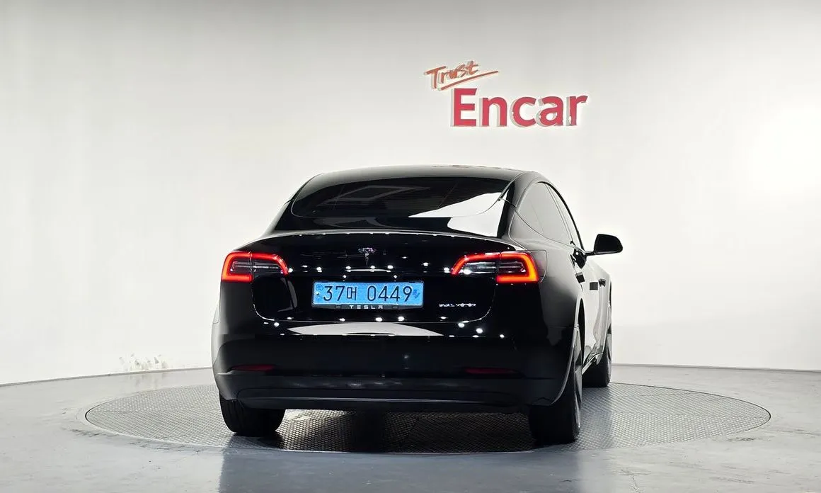 Tesla Model 3 — фото 4