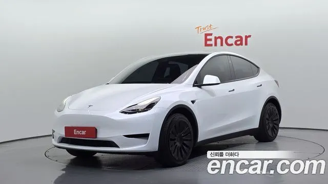 Tesla Model Y — фото 1