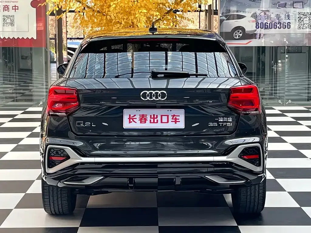 Audi Q2L — фото 9