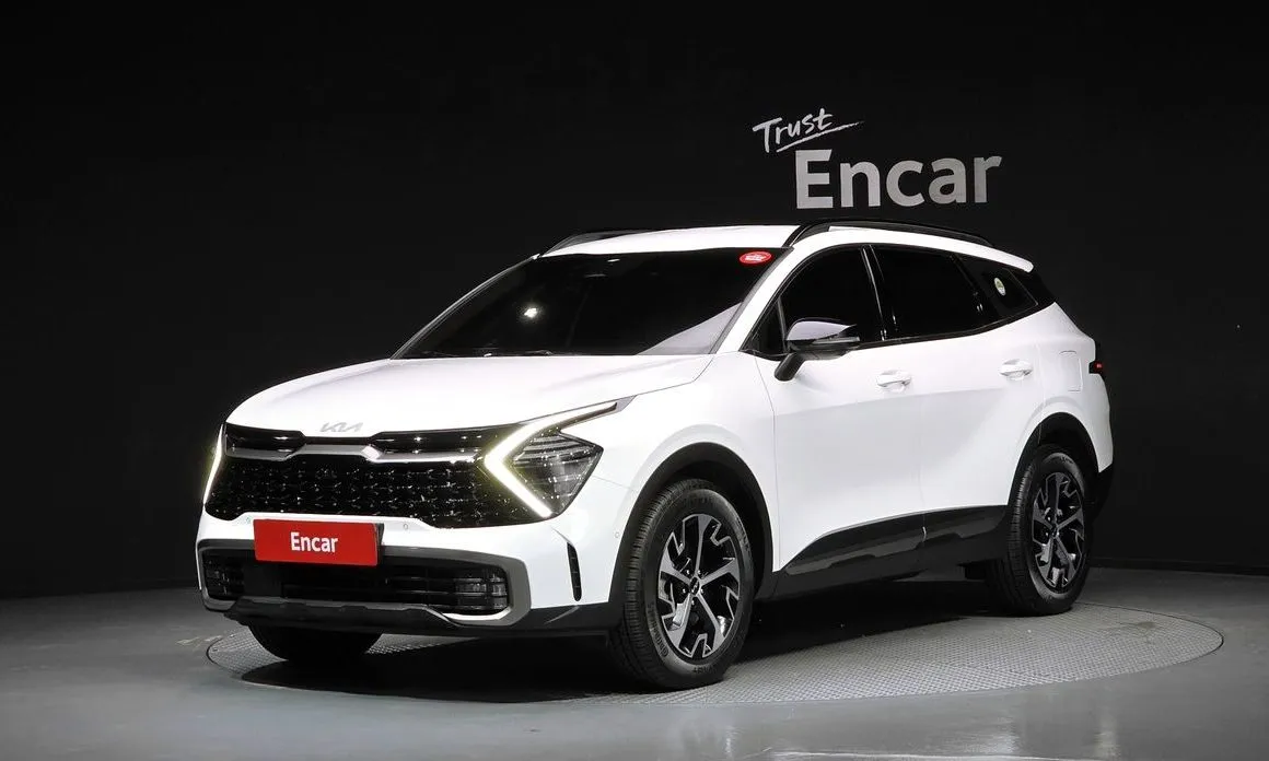 Kia Sportage — фото 1
