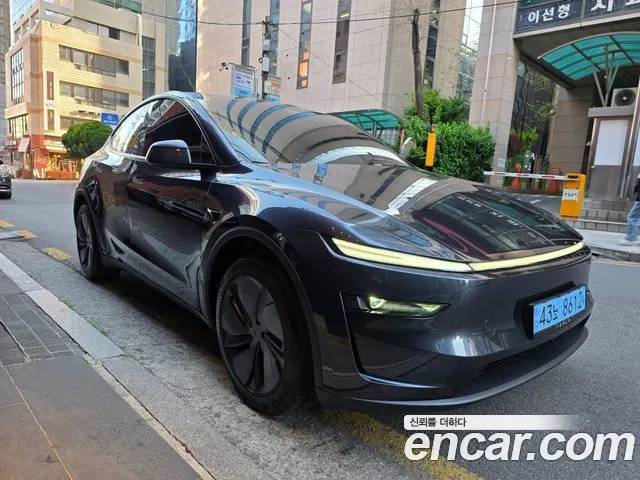 Tesla Model Y — фото 7