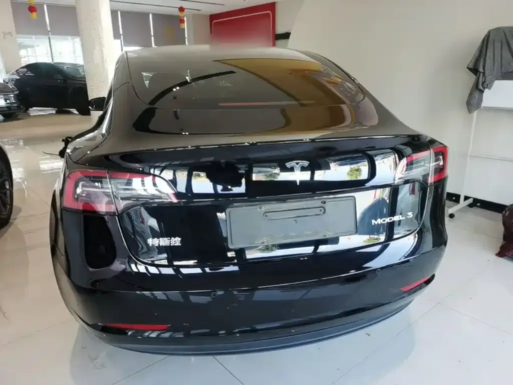 Tesla Model 3 — фото 7