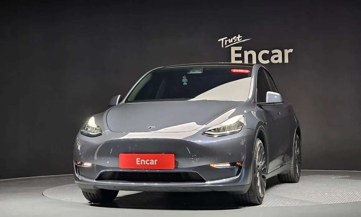 Tesla Model Y — фото 8