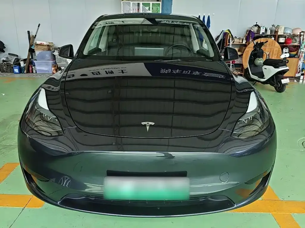 Tesla Model Y — фото 10