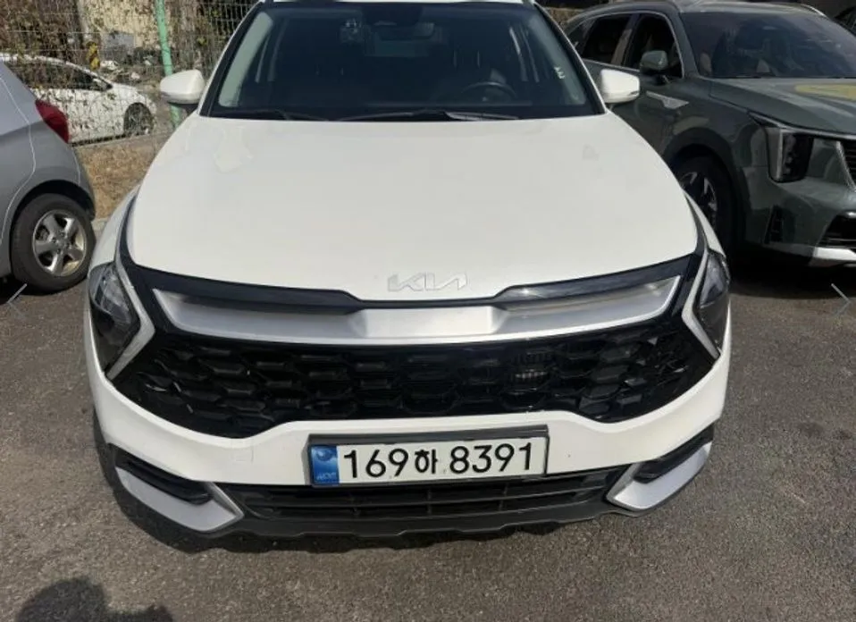 Kia Sportage — фото 1