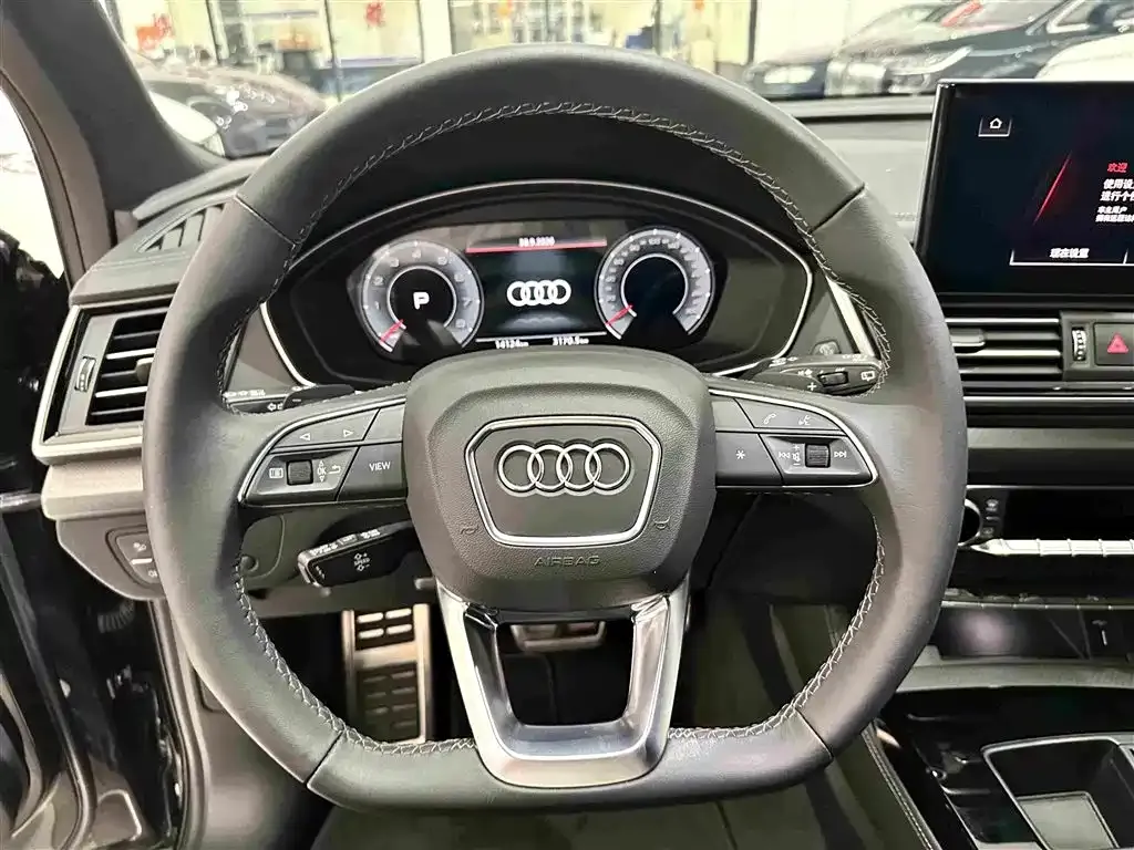 Audi Q5L — фото 7
