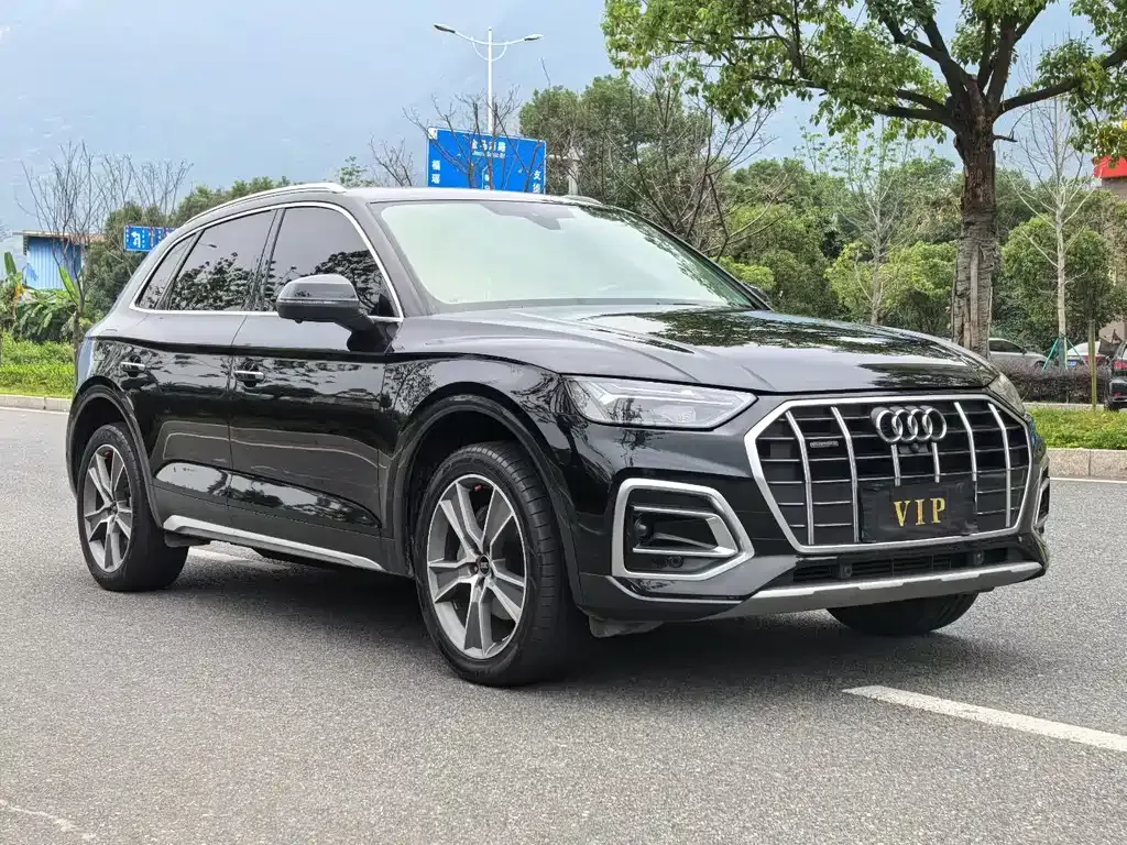 Audi Q5L — фото 5