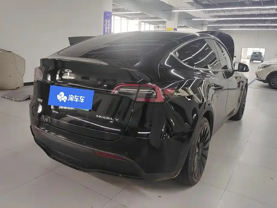 Tesla Model Y — фото 9