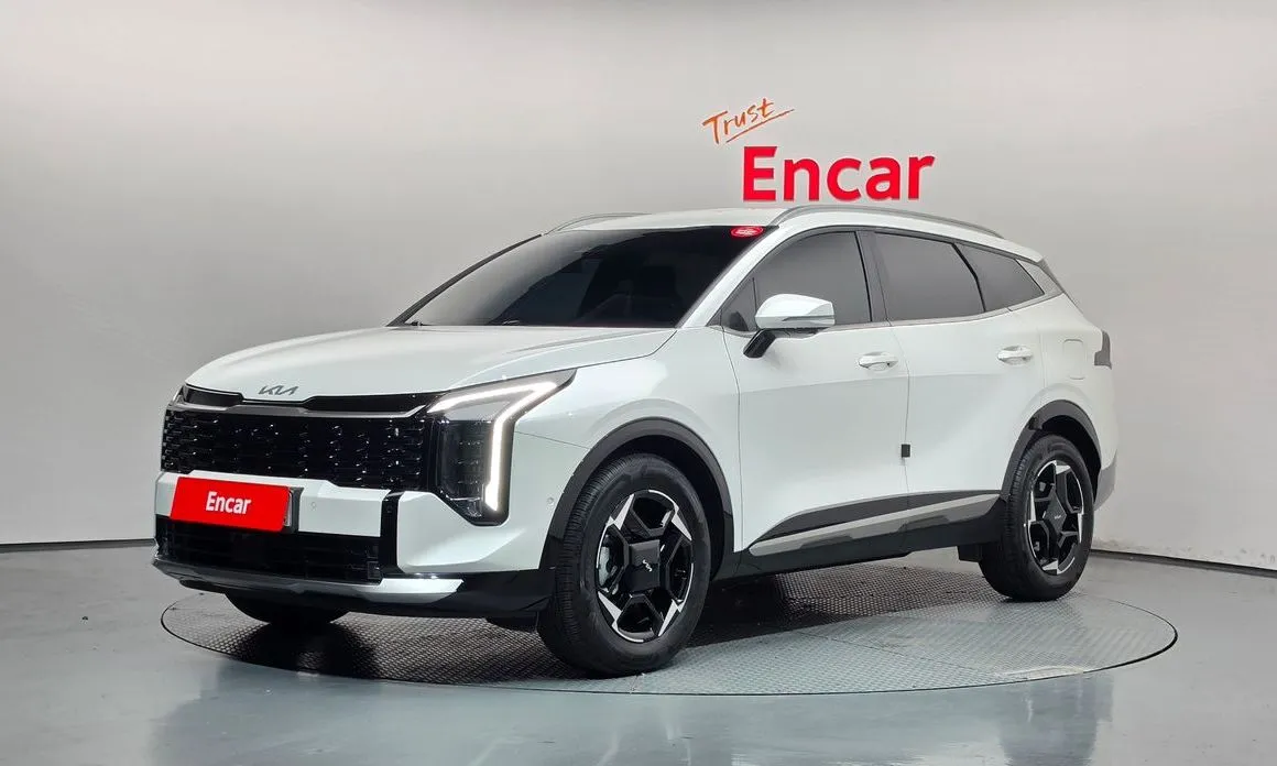 Kia Sportage — фото 1