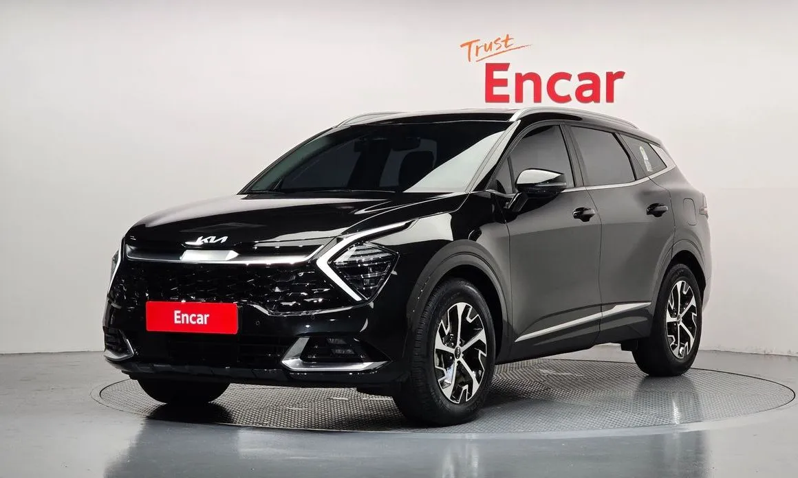 Kia Sportage — фото 1