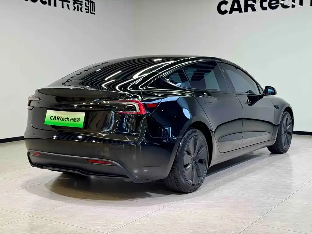 Tesla Model 3 — фото 7